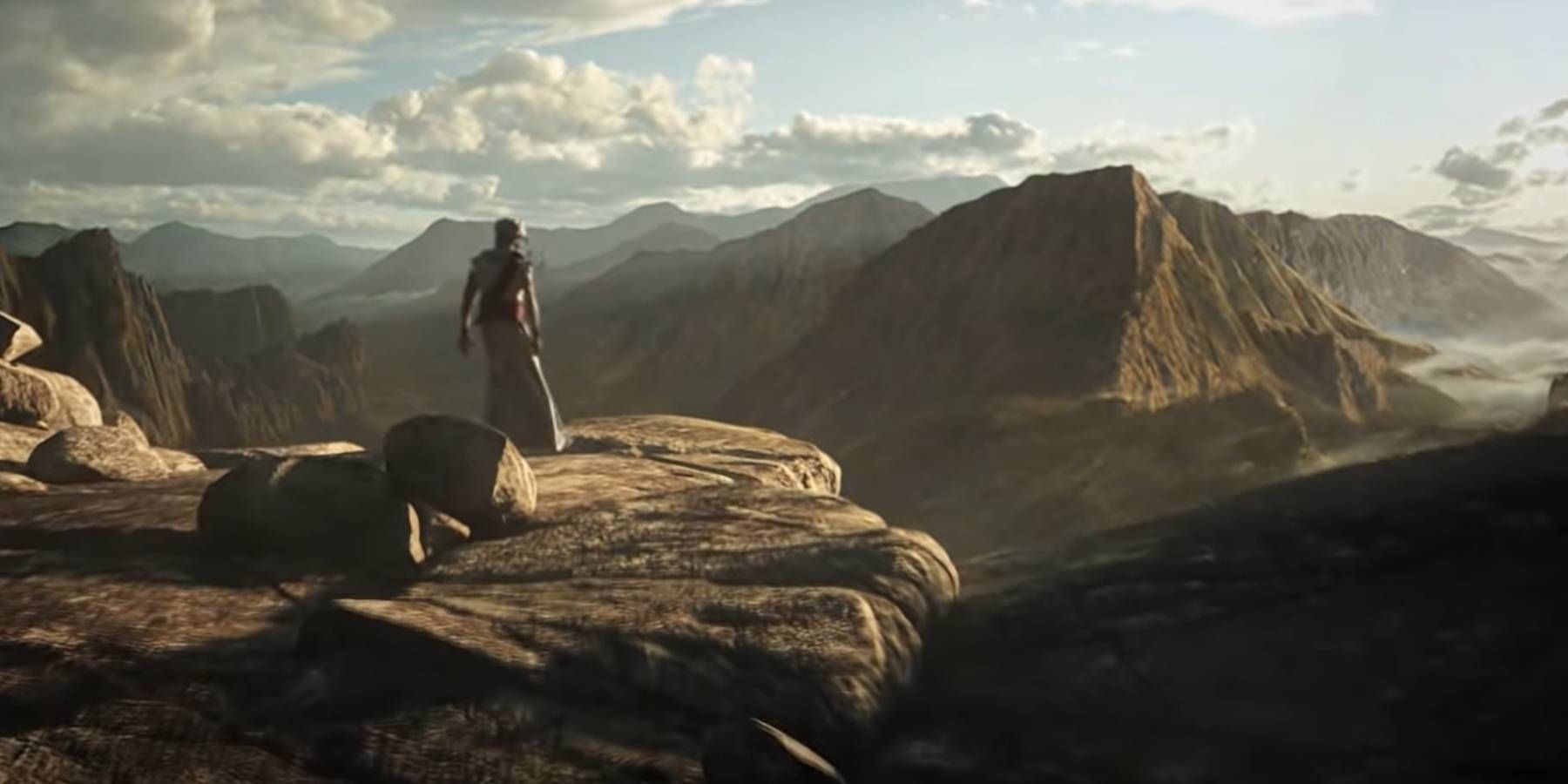 A man looking out from a cliff in the intro for Civilization 5