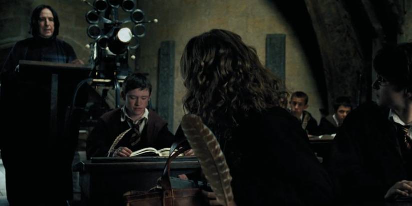 Hermione and Harry watch as Snape fills in for Remus Lupin in Harry Potter and the Prisoner of Azkaban.