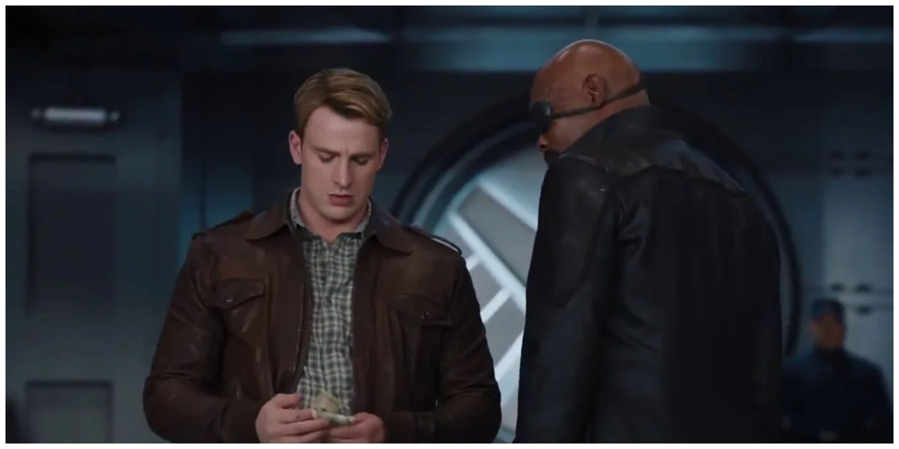 Chris Evans as Captain America. Samuel L. Jackson as Nick Fury.