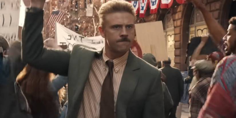 agent klaber neo-nazi firing a gun into a parade