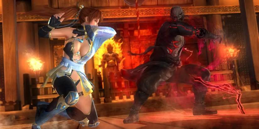 Two characters in a heated battle, one a skimpily clad woman, the other a demonic looking humanoid.