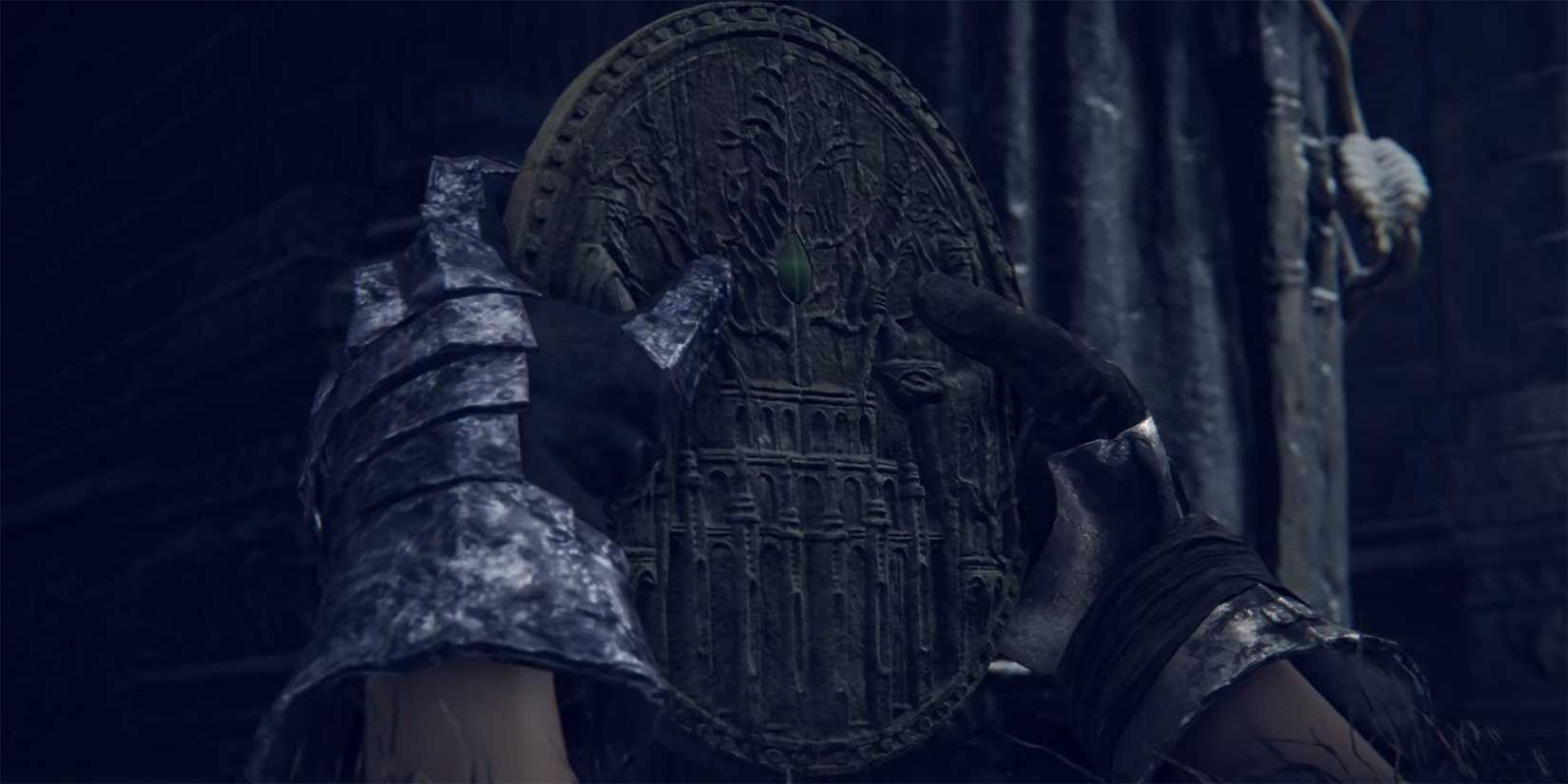 Elden Ring - Tarnished Holding Up The Completed Secret Medallion
