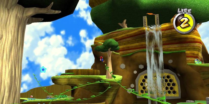 Mario climbing a vine in the Honeyhive Galaxy