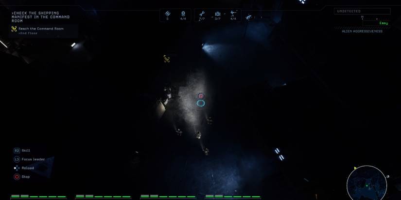 Gameplay screenshot of Aliens: Dark Descent, showing the marines standing in formation
