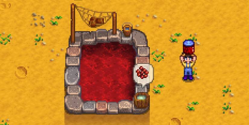 A farmer holding Lava Eel Aged Roe near a Lava Eel fish pond in Stardew Valley