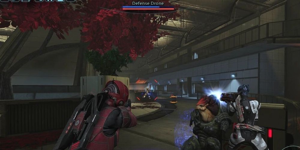 Player, Rex, And Liara In Combat With A Defense Drone