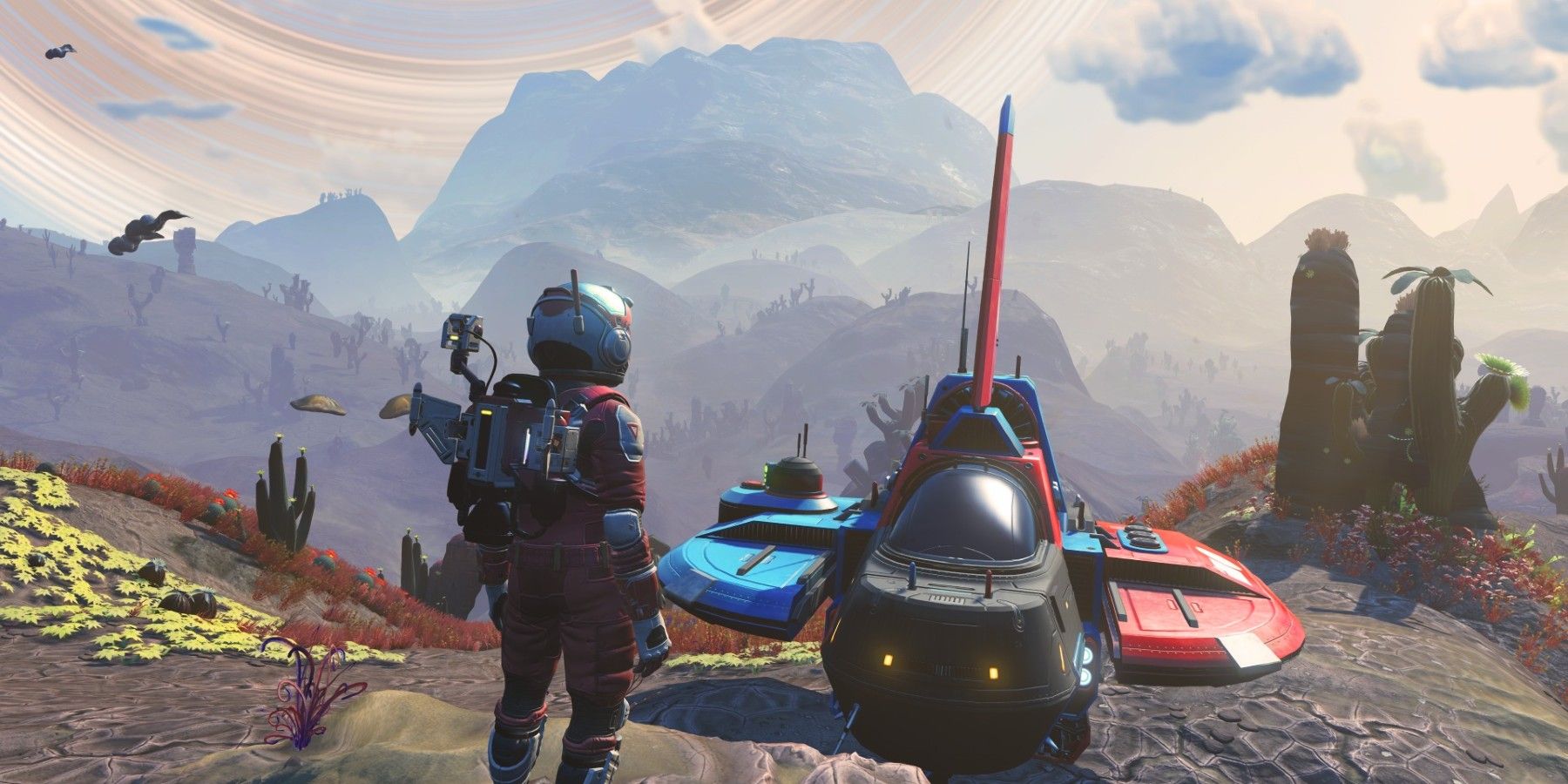 No Man's Sky character looking at spacecraft