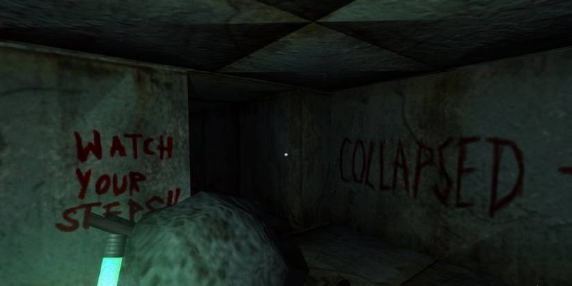 An example of the dark environment of Black Plague, feebly lit by a green glowstick. 