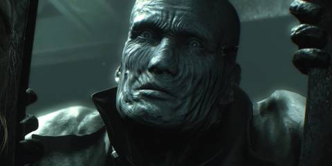 Mr X rending open two metal doors, his eye fixed on his victims. 