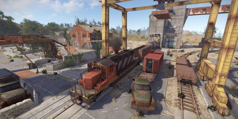 Rust unloading train car event at Train Yard monument