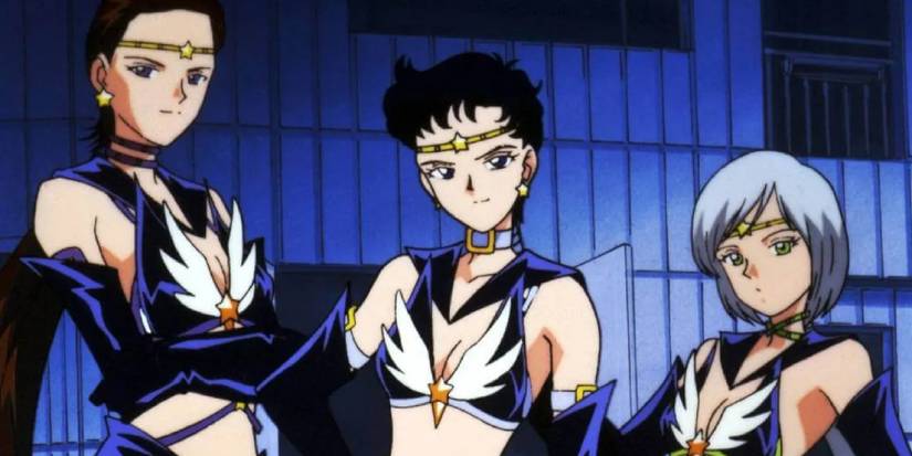 The Sailor stands stand in a height-ordered line, wearing a black mockery of the Sailors outfits. 