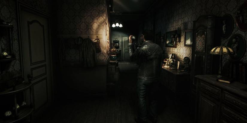 Song of horror player with flashlight