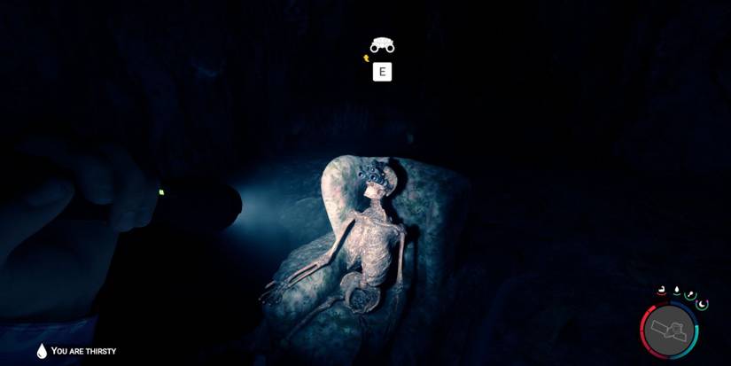 Player examining the emaciated body that os little more than a skeleton.