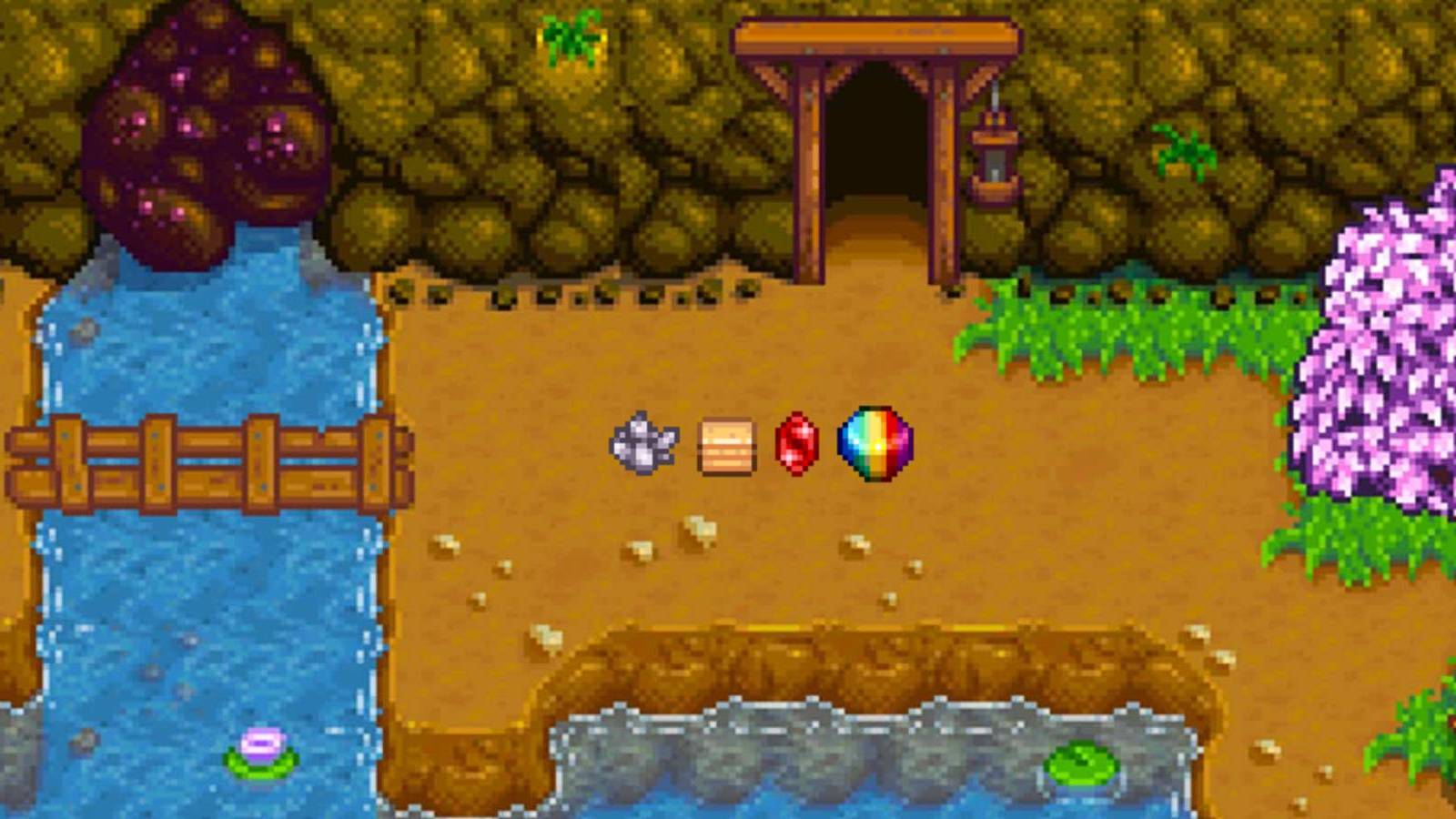 Quartz, Sandstone, Ruby, and a Prismatic Shard in front of the mine in Stardew Valley
