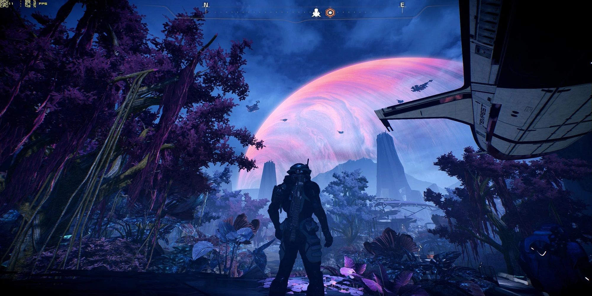 figure standing in the middle of a jungle looking up at a planet next to a ship