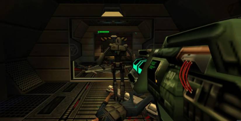 System Shock combat aiming a weapon at a robot enemy