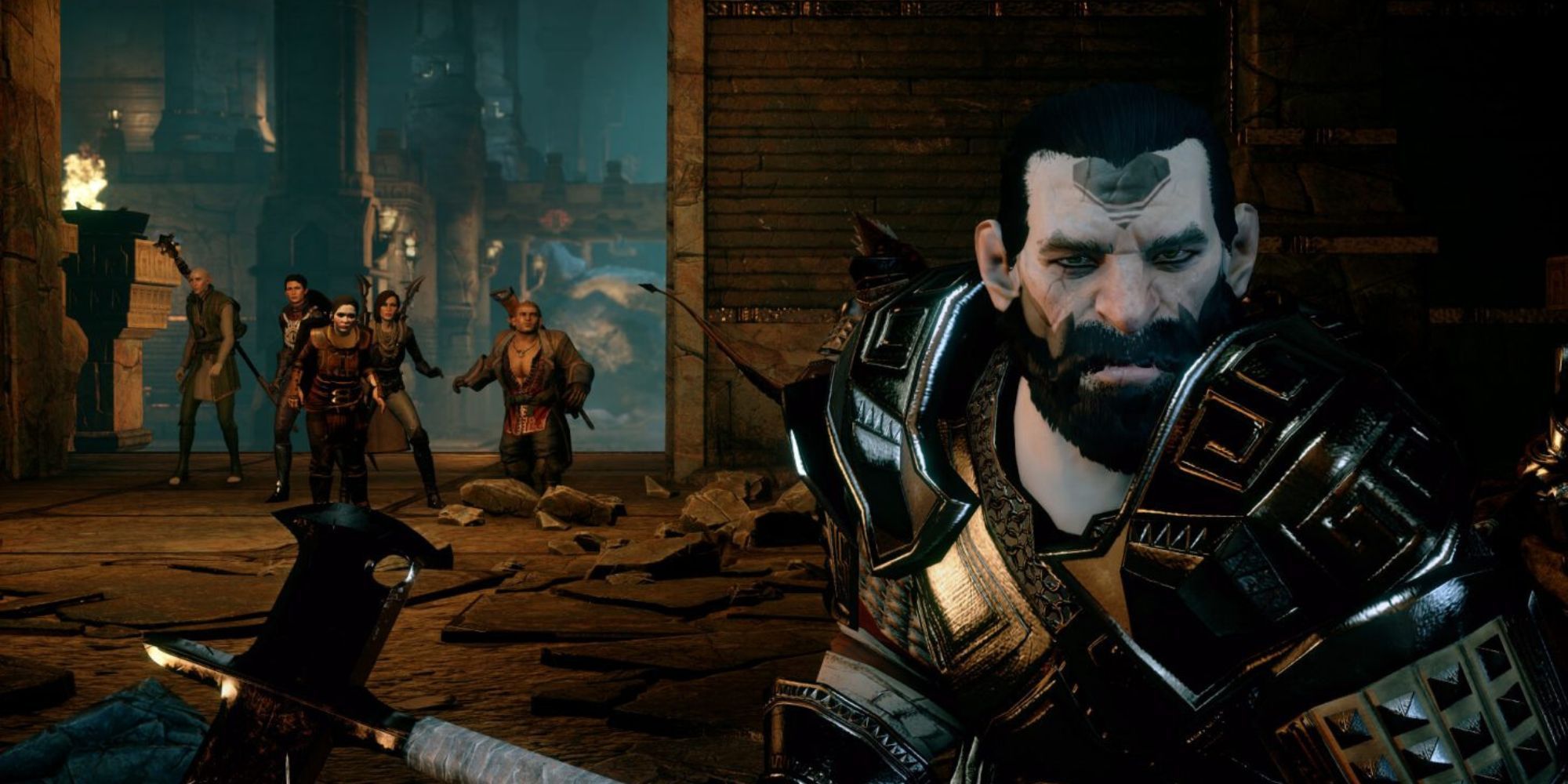 A close up of a male dwarf with the Inquisitor and their team behind him in The Descent DLC in Dragon Age Inquisition