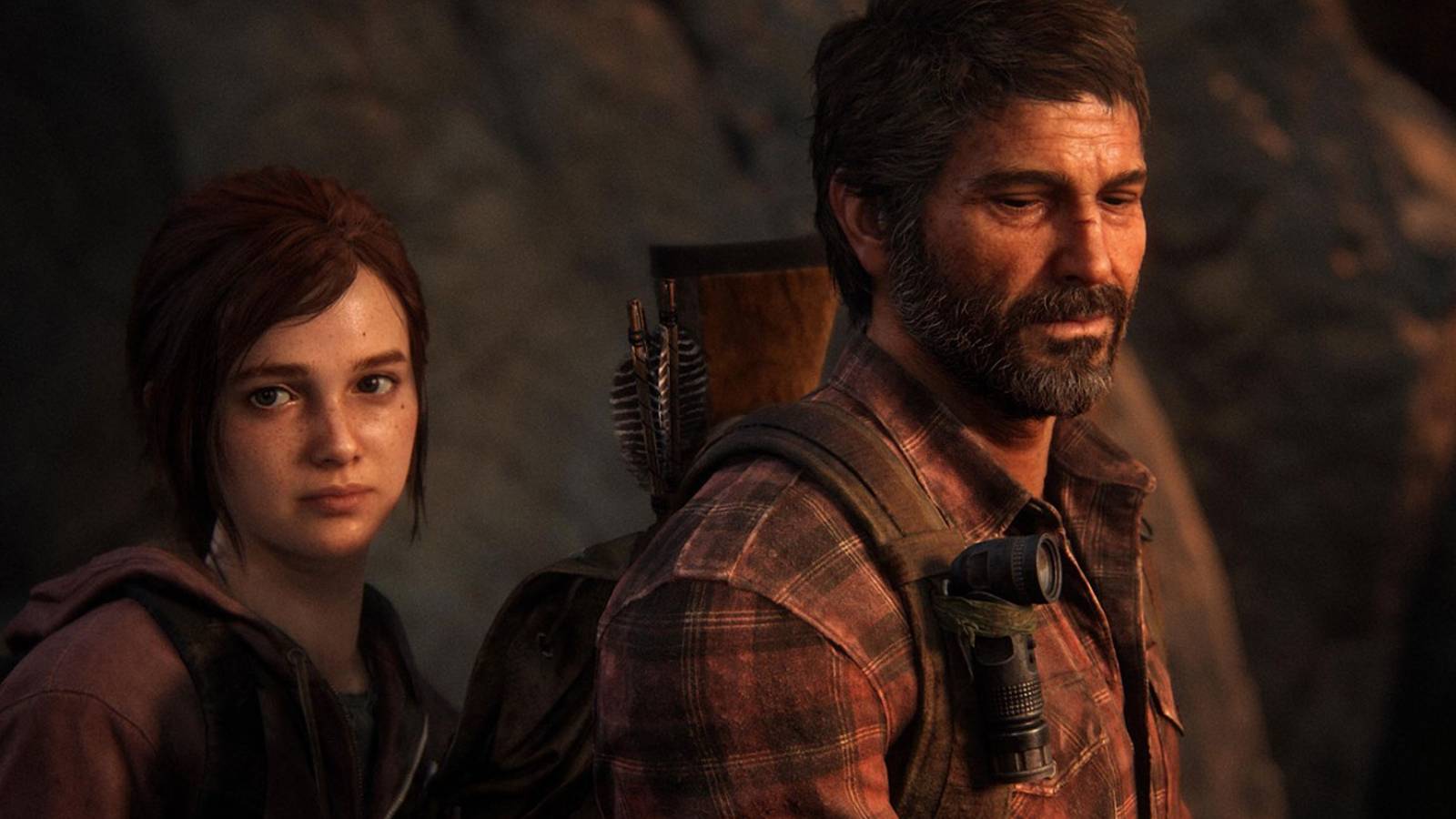 Joel and Ellie look exhausted against the backdrop of a rocky hill