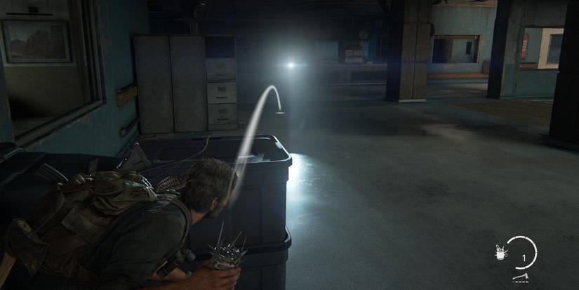 The Last of Us Part 1 Firefly Lab Joel throwing nail bomb