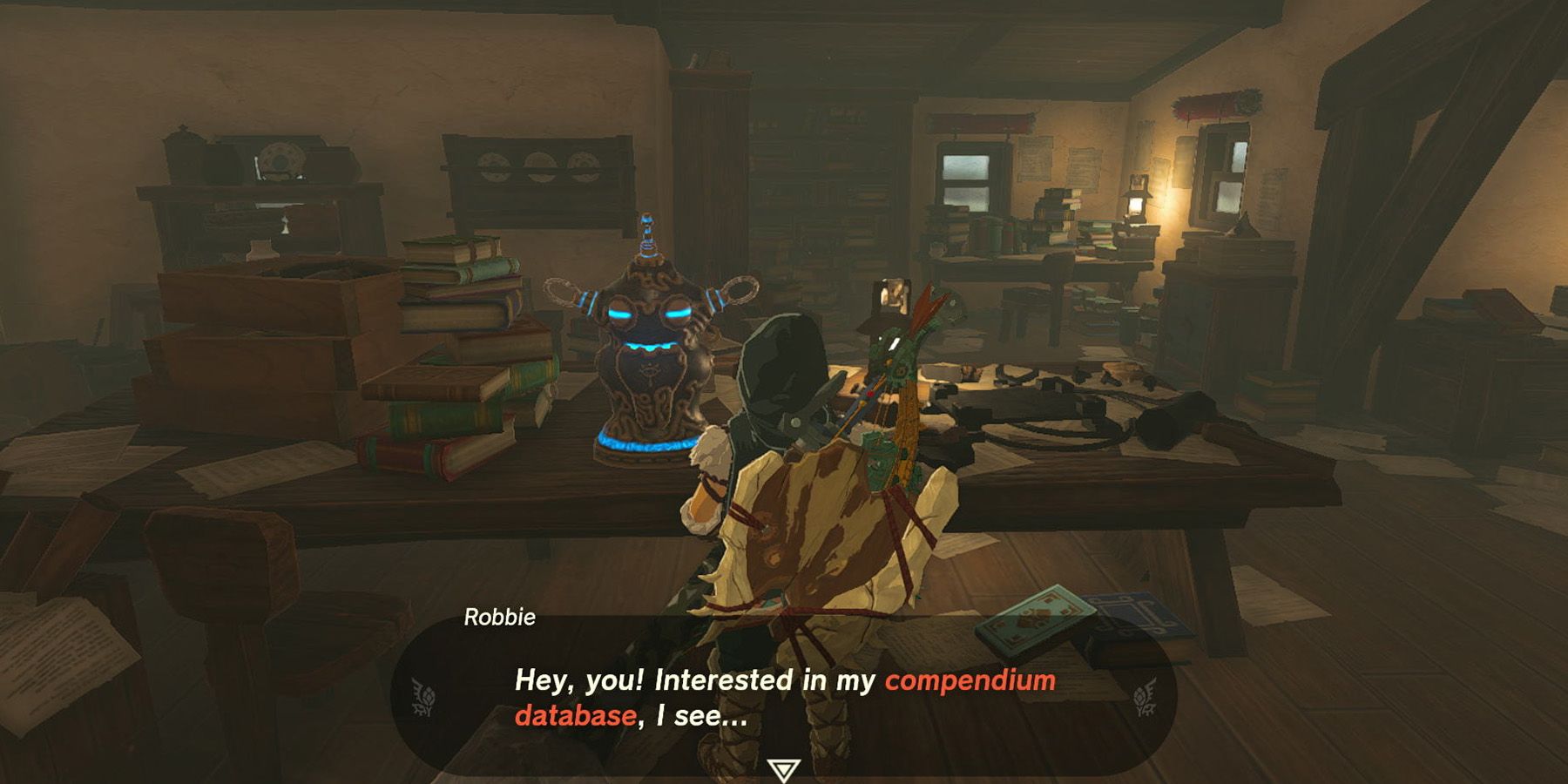 Interacting with the Hyrule Compendium in Zelda: Tears of the Kingdom.