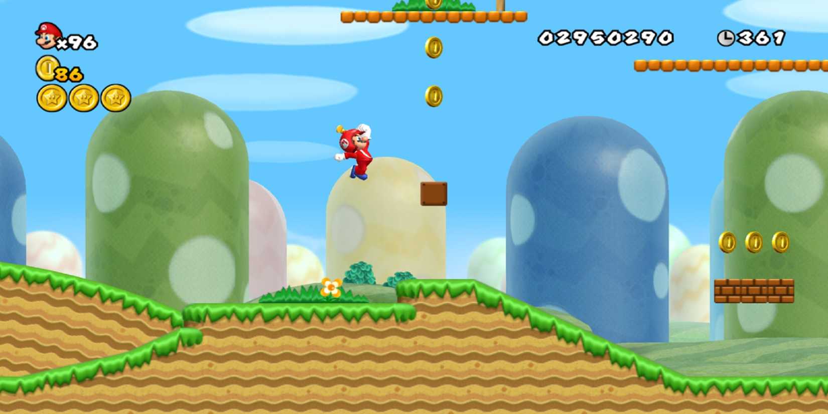 propeller mario jumping towards some coins