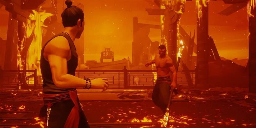 Sifu Fighting An Enemy In A Burning Building