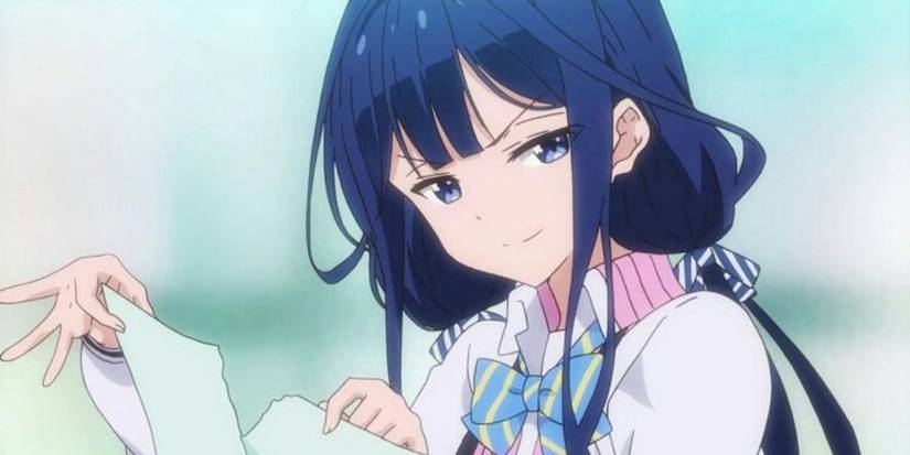 Aki Adagaki tearing a piece of paper