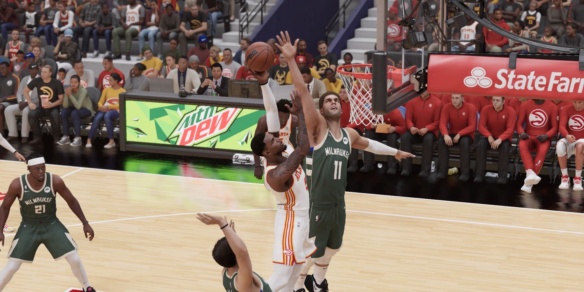 Brook Lopez of the Milwaukee Bucks attempting to block a layup in NBA 2K23