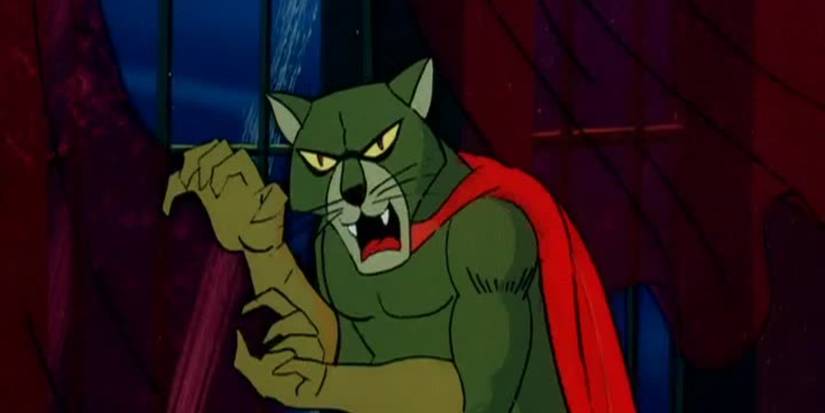 cat creature with a red cape on looking menacing