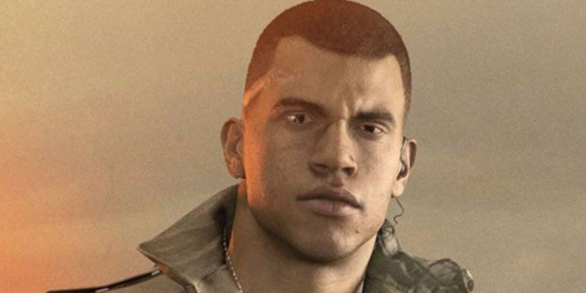 clay with a shaved head and earpiece