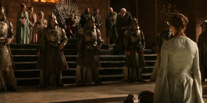 King Joffrey and Sansa Stark in the throne room in Game of Thrones.