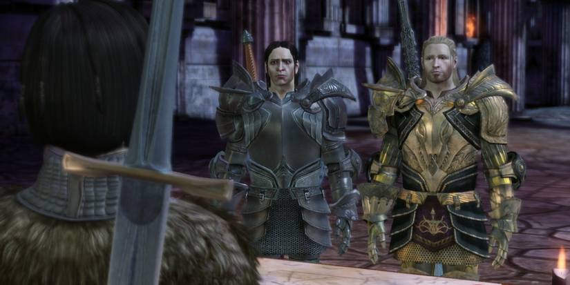 Cousland Warden discusses tactics with King Cailan and Loghain at Ostagar in Dragon Age: Origins