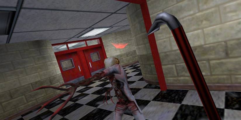 Half-Life fighting a crabhead with the crowbar
