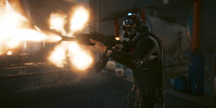 V firing an assault rifle in Cyberpunk 2077