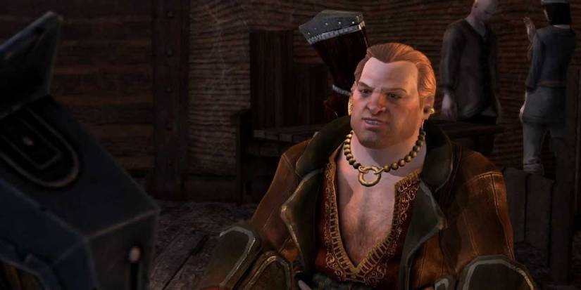 Varric Tethras in Dragon Age 2, addressing an unseen person.