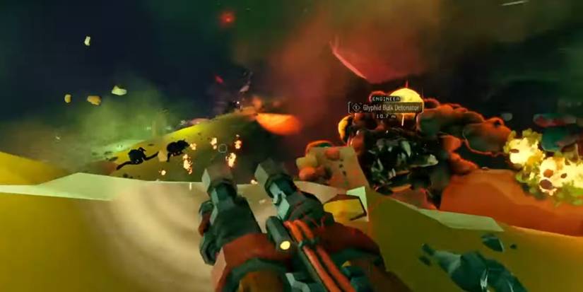 Deep Rock Galactic Glyphid Bulk Detonator running at Gunner player in a sandy cave.