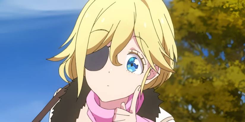 Muriel Besson with a finger pointed up