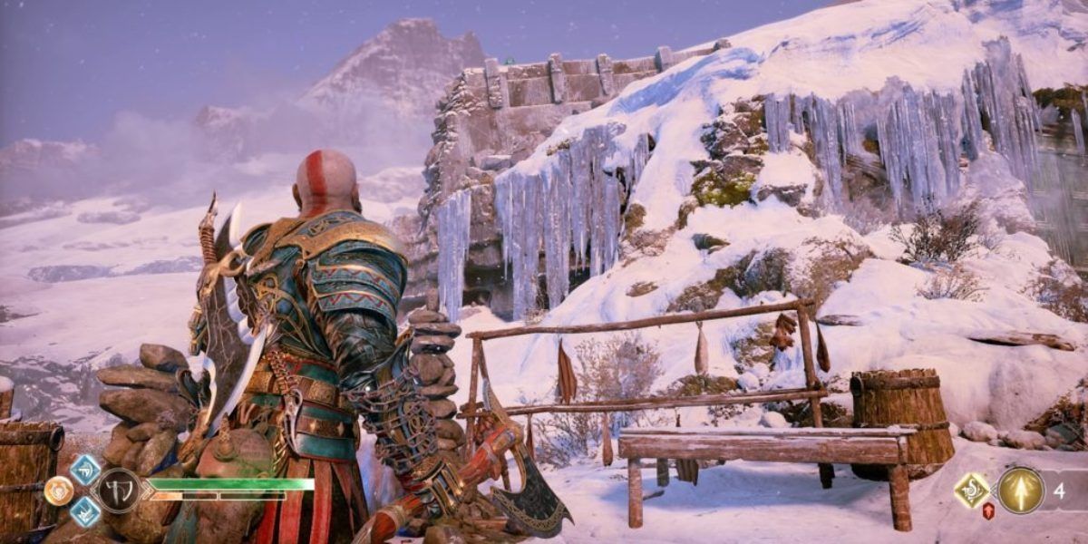 Kratos looks at one of Odin's ravens perched on an icy rock