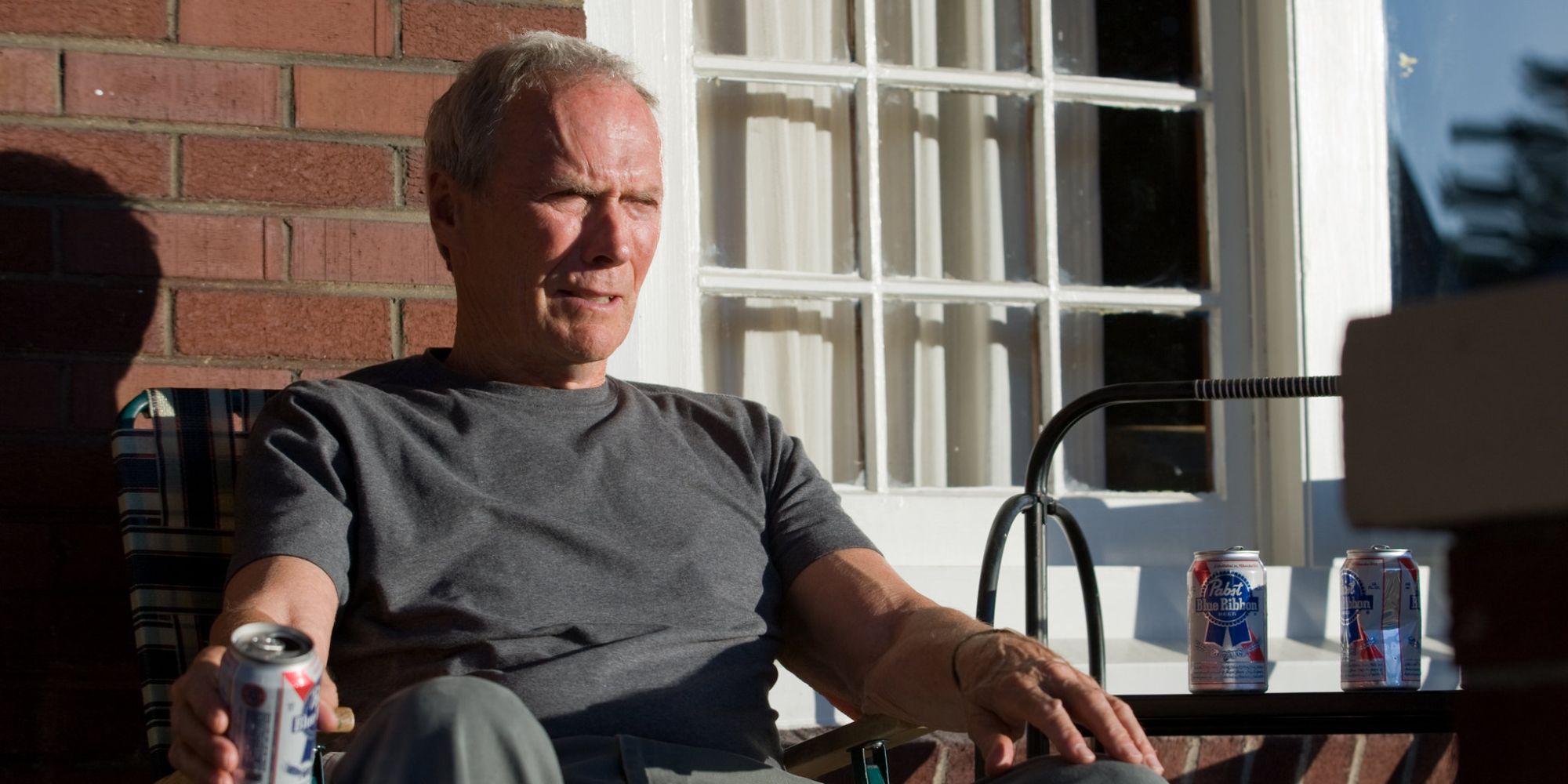 Gran Torino Walt sat on his porch with a beer