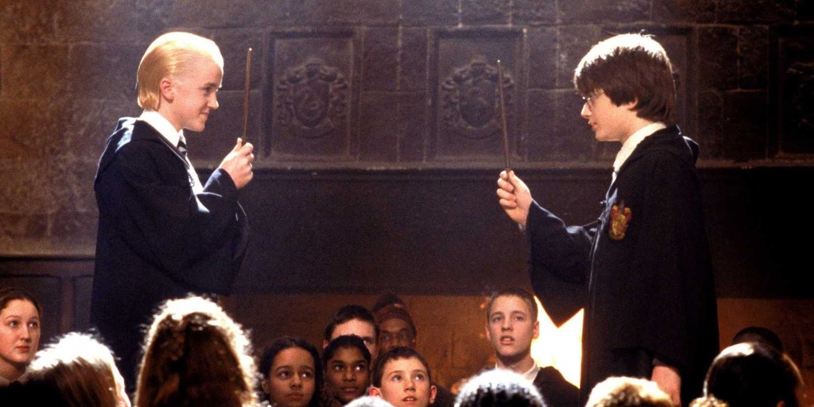 Harry and Draco with their wands at Hogwarts in Harry Potter