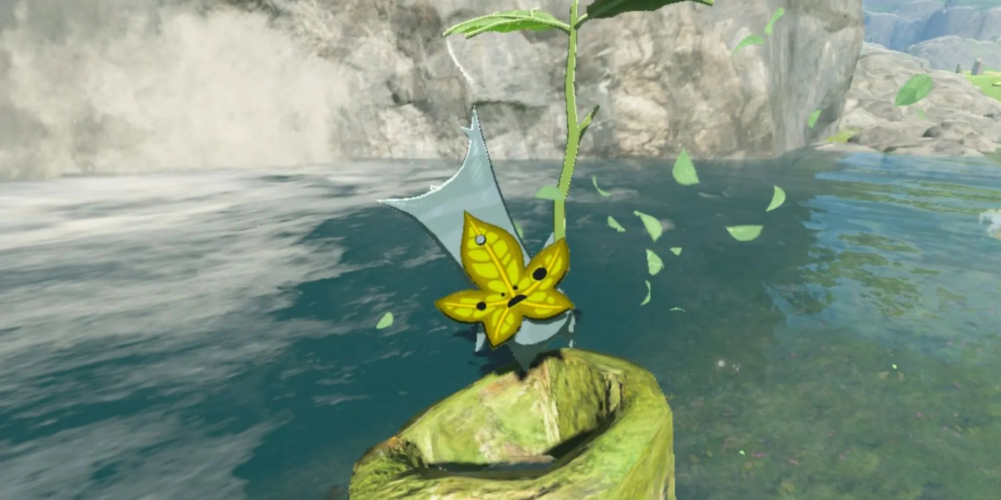 A Korok floating in a river with a Korok Leaf
