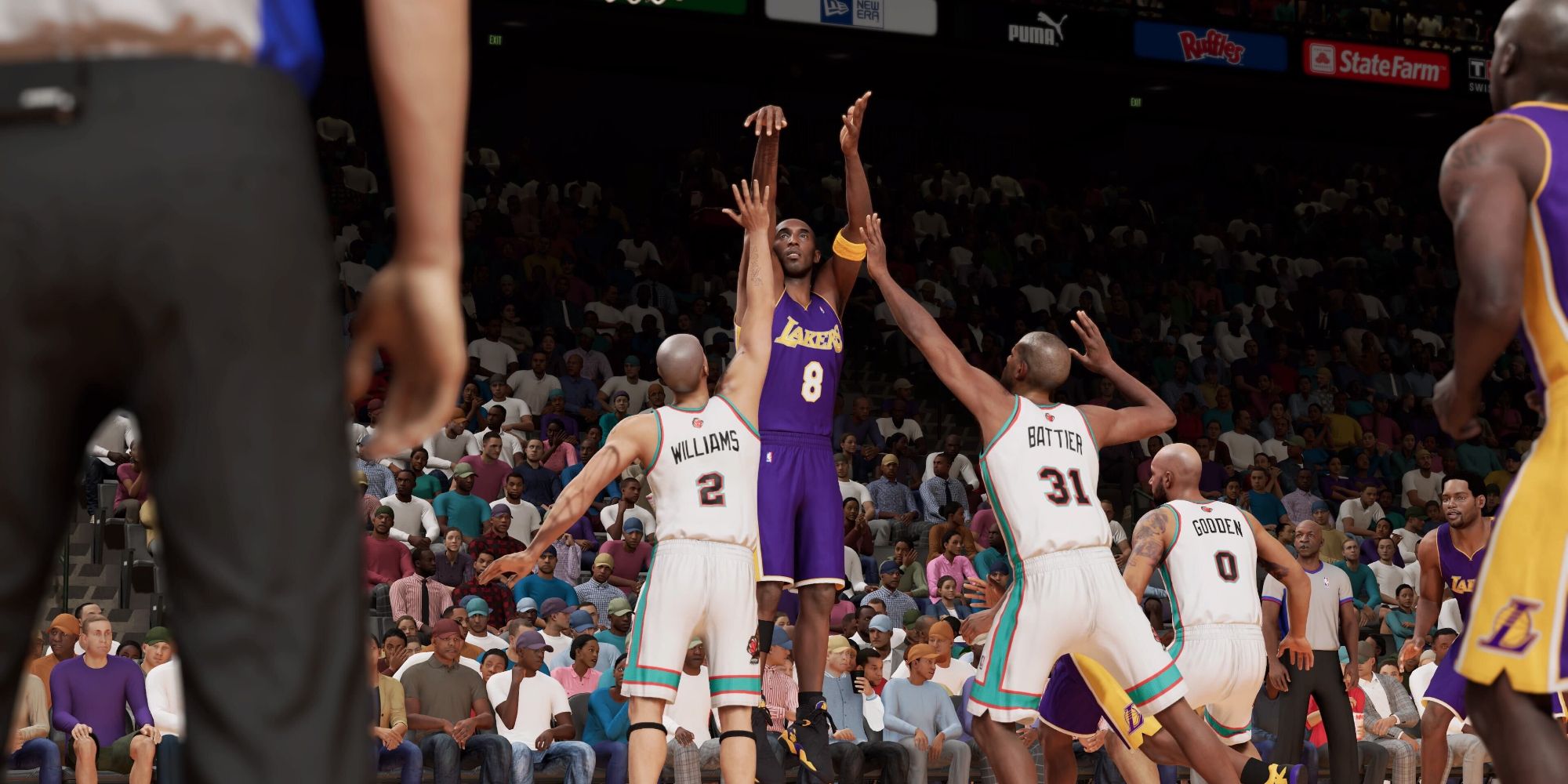 Kobe Bryant taking a jump shot over two defenders in NBA 2K23