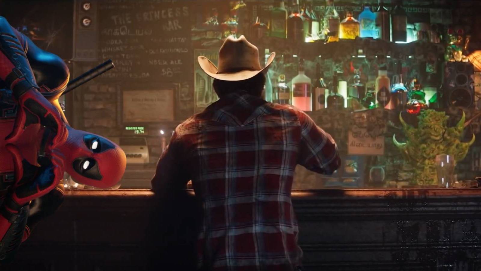 Deadpool leaning into a shot from the Marvel's Wolverine reveal trailer