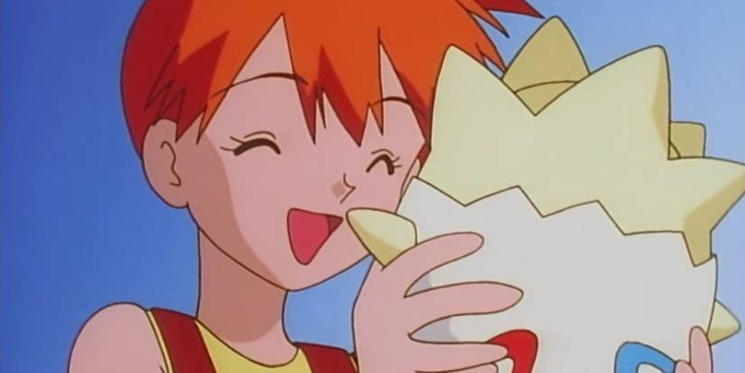Misty holding Togepi