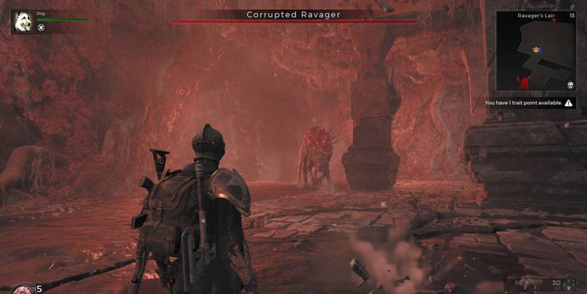 A player in Remnant 2 in a battle with the Corrupted Ravager