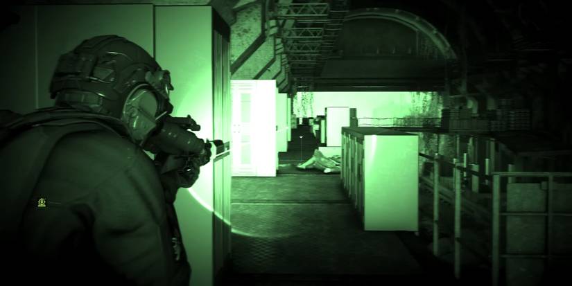 A player aiming down the sights while in night vision mode in Ghost Recon: Breakpoint