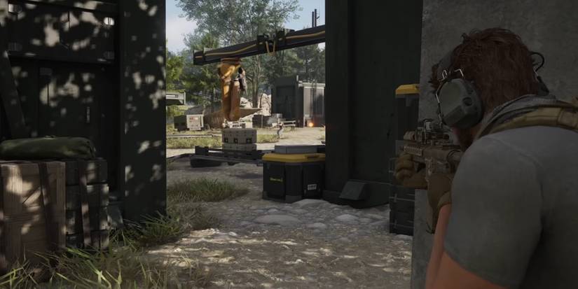 A player infiltrating a hostile base in Ghost Recon: Breakpoint