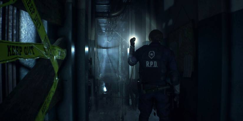 Leon looking down a hall in Resident Evil 2