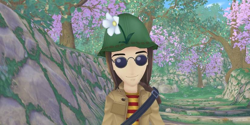 The bachelor Gustafa, smiling benevolently towards the camera as he stands in the spring-time forest.