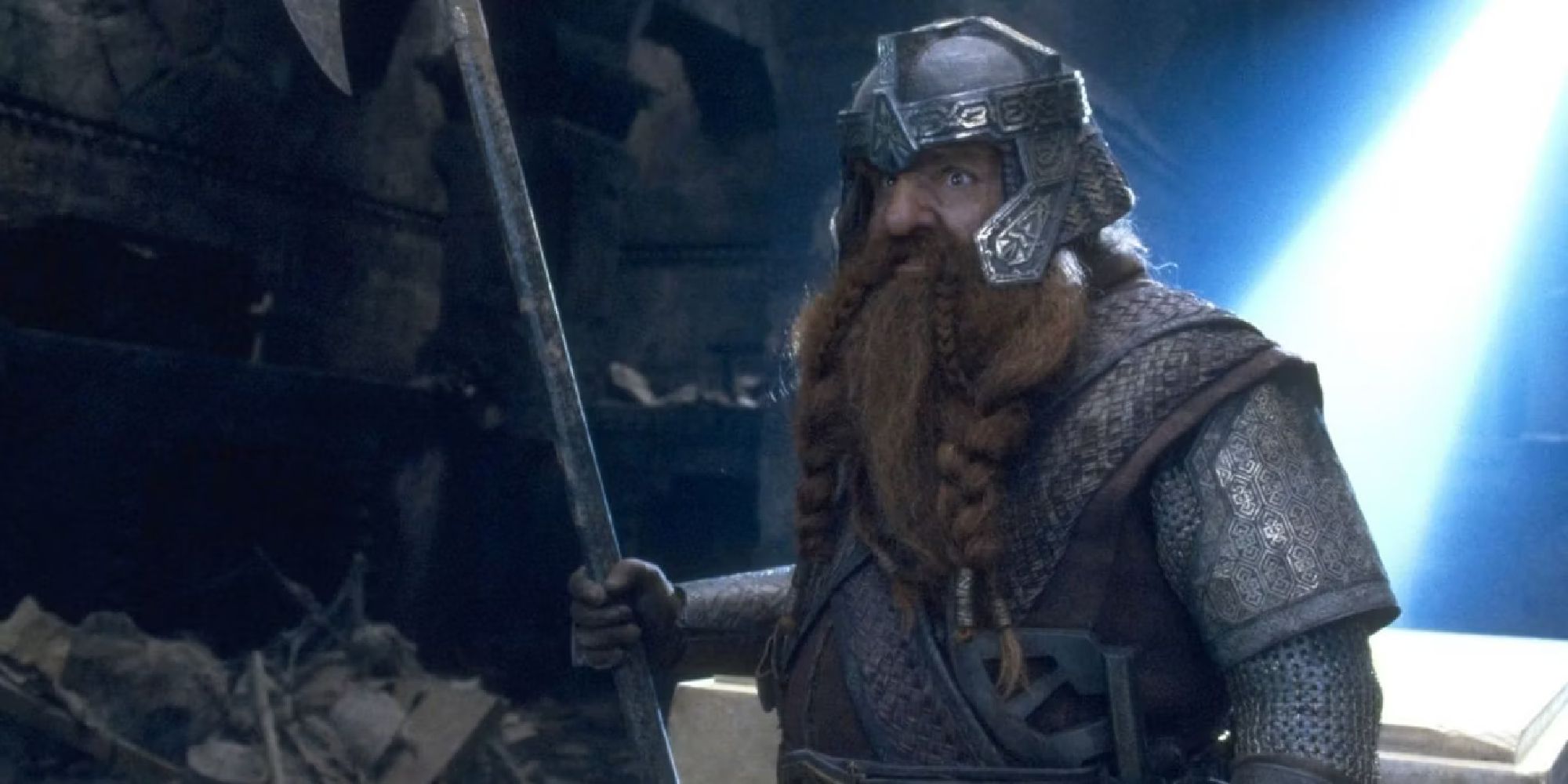 Gimli stands in the Mines of Moira, holding his trusty axe.